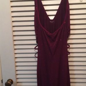 New never worn purple gown with full side slits